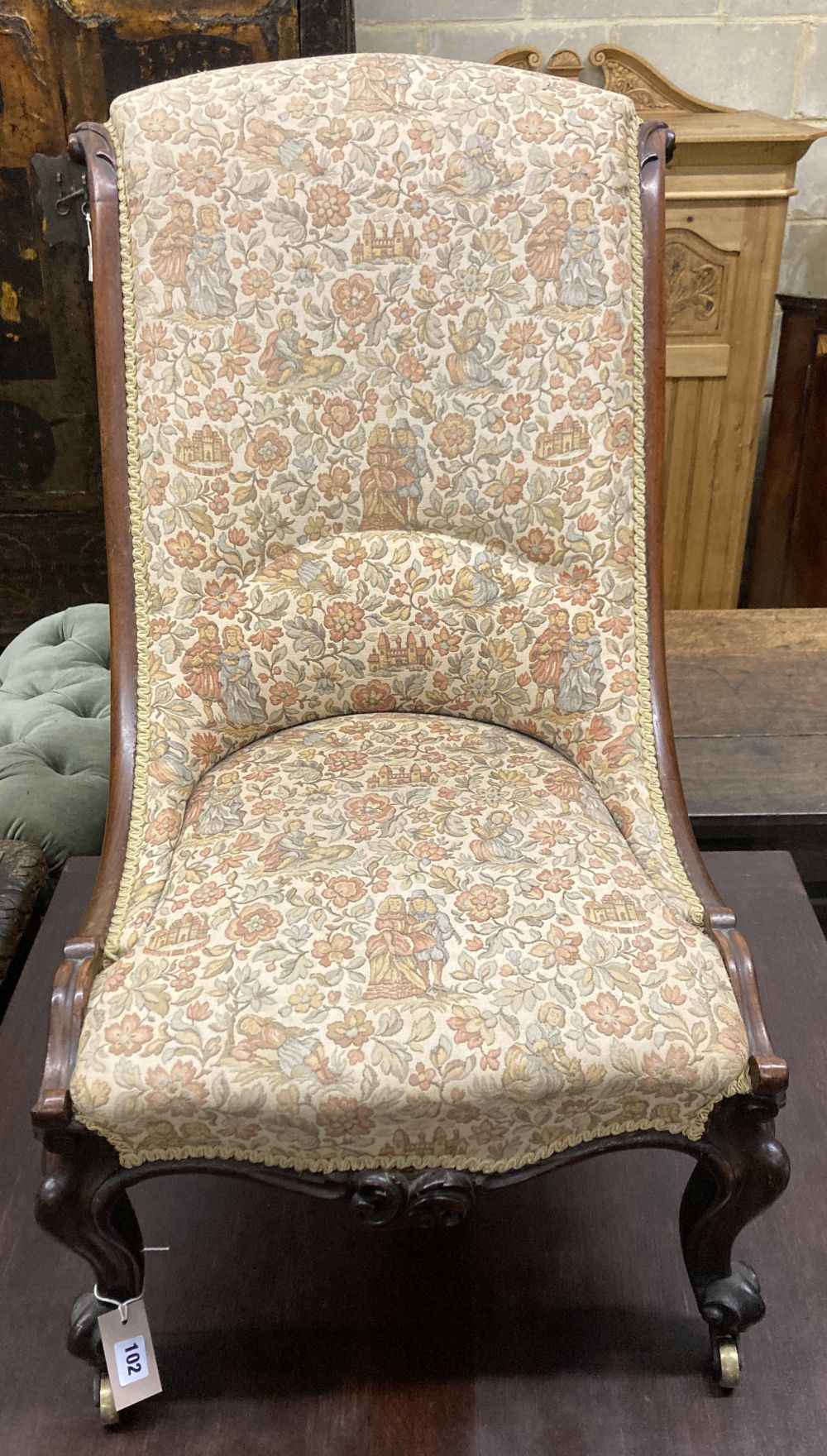 A Victorian rosewood nursing chair